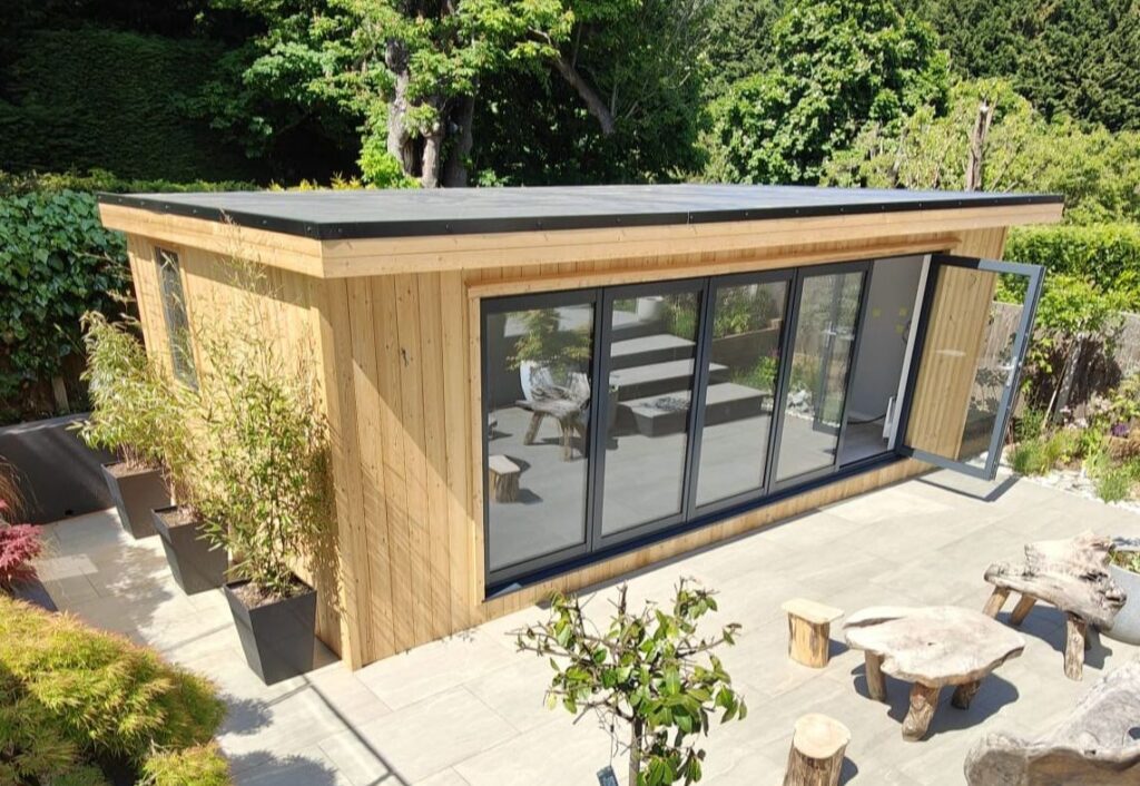 A stunning timber garden room in a patio setting built to measure as a pilates studio